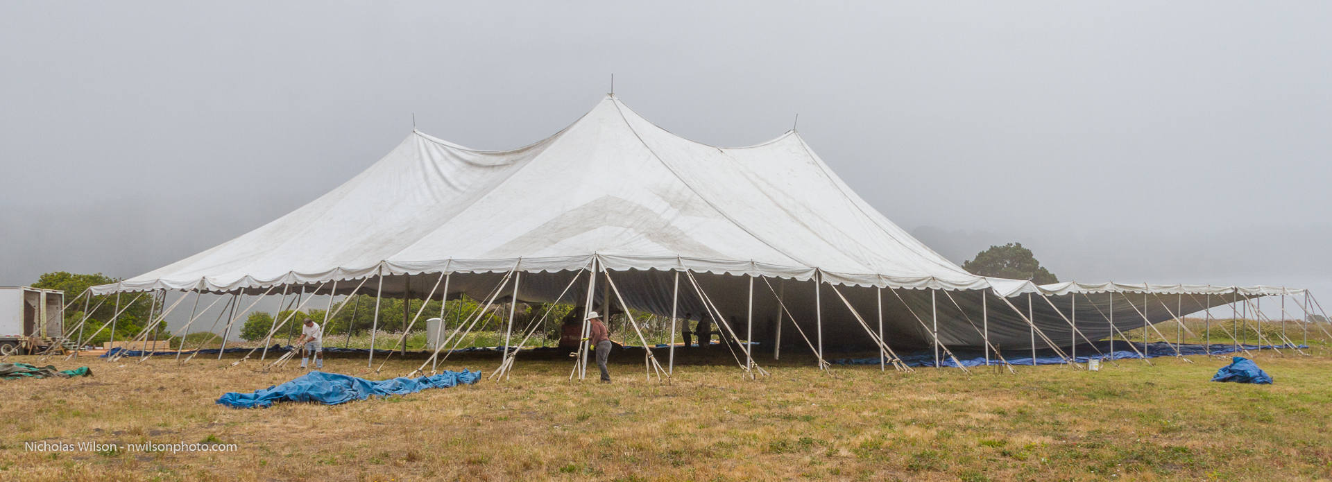The tent was raised on June 26. It was only half up in this shot.
