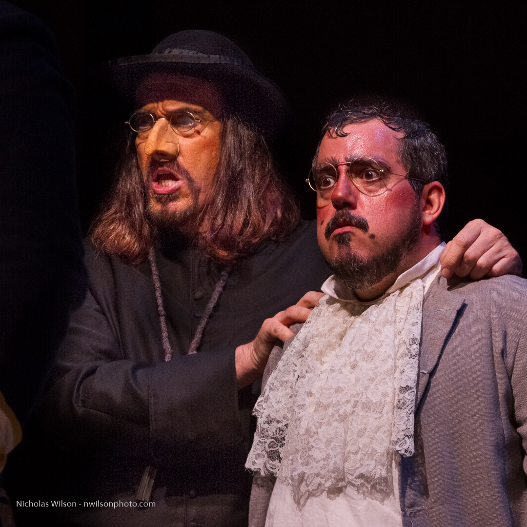 Don Basilio (Dennis Rupp) and Dr. Bartolo (Igor Vieira) in a dramatic scene from The Barber of Seville
