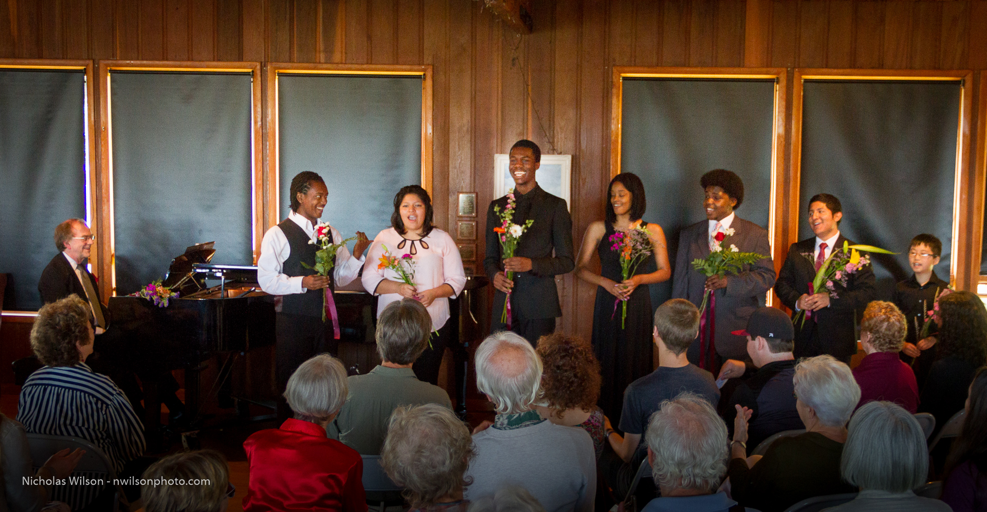YMCO singers with bouquets