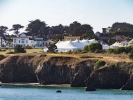 A 2015 view across the mouth of Big River of the Mendocino Music Festival's 800 seat concert hall tent.