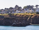 Panoramic view of Mendocino across Mendocino Bay. The music festival's big top tent has been a landmark every July since 1986.